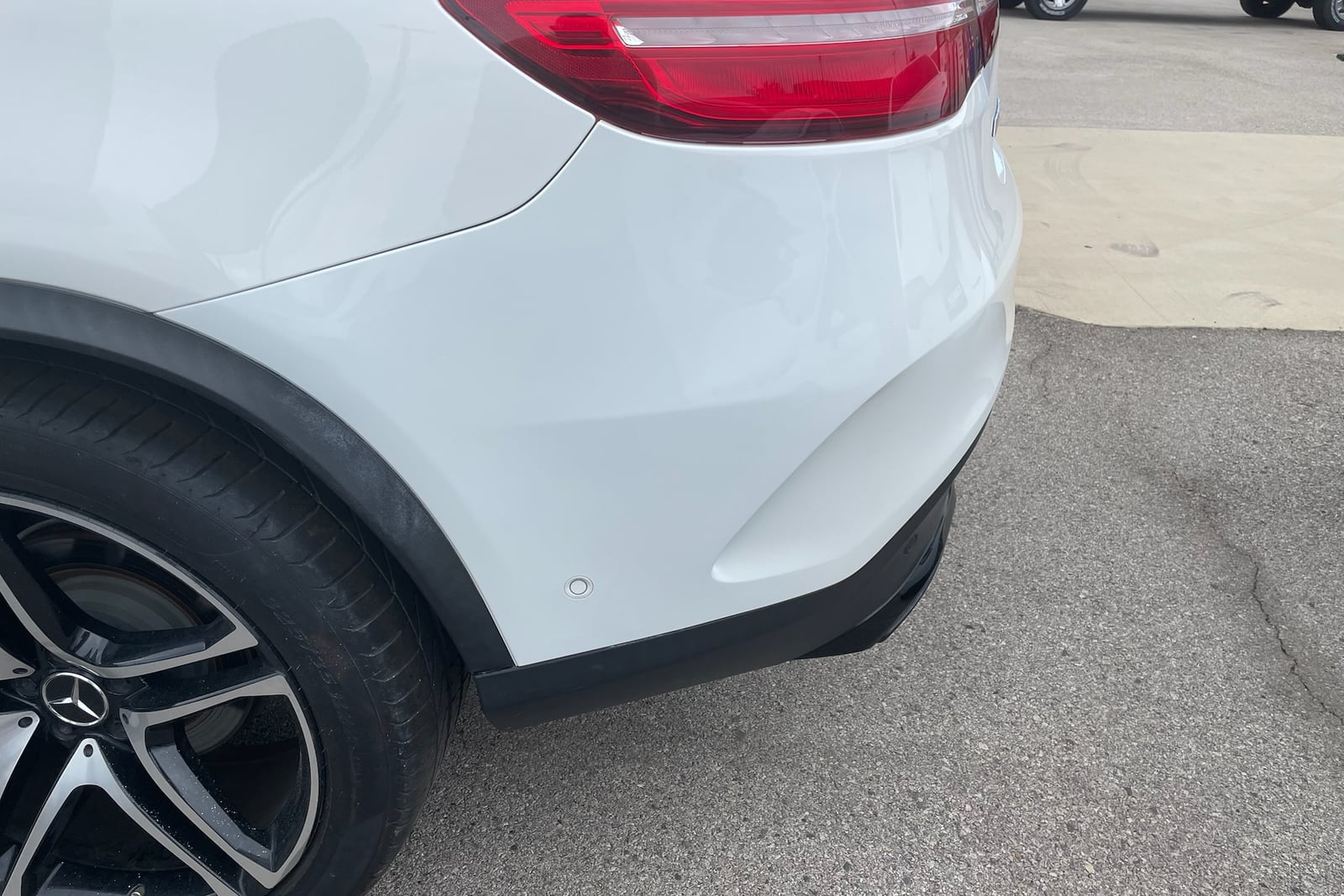 After: Dented rear quarter panel — before and after repair by Dr. Vinyl DFW