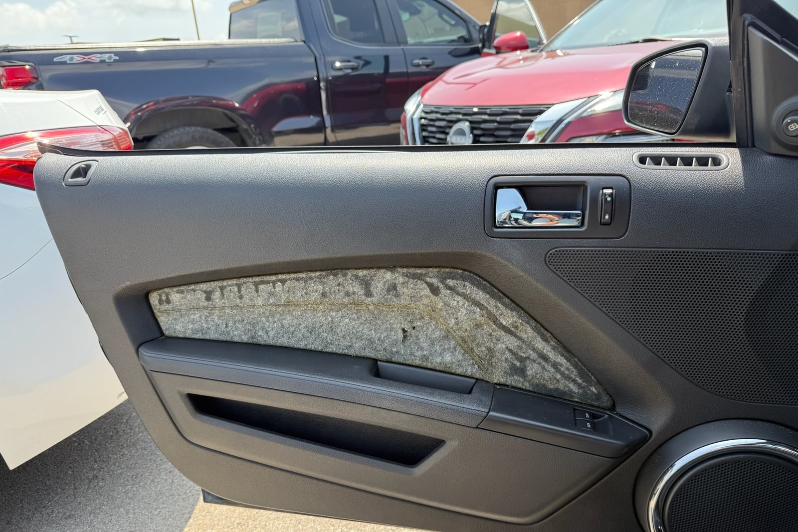 Before: Mustang door panel insert — before and after repair by Dr. Vinyl DFW